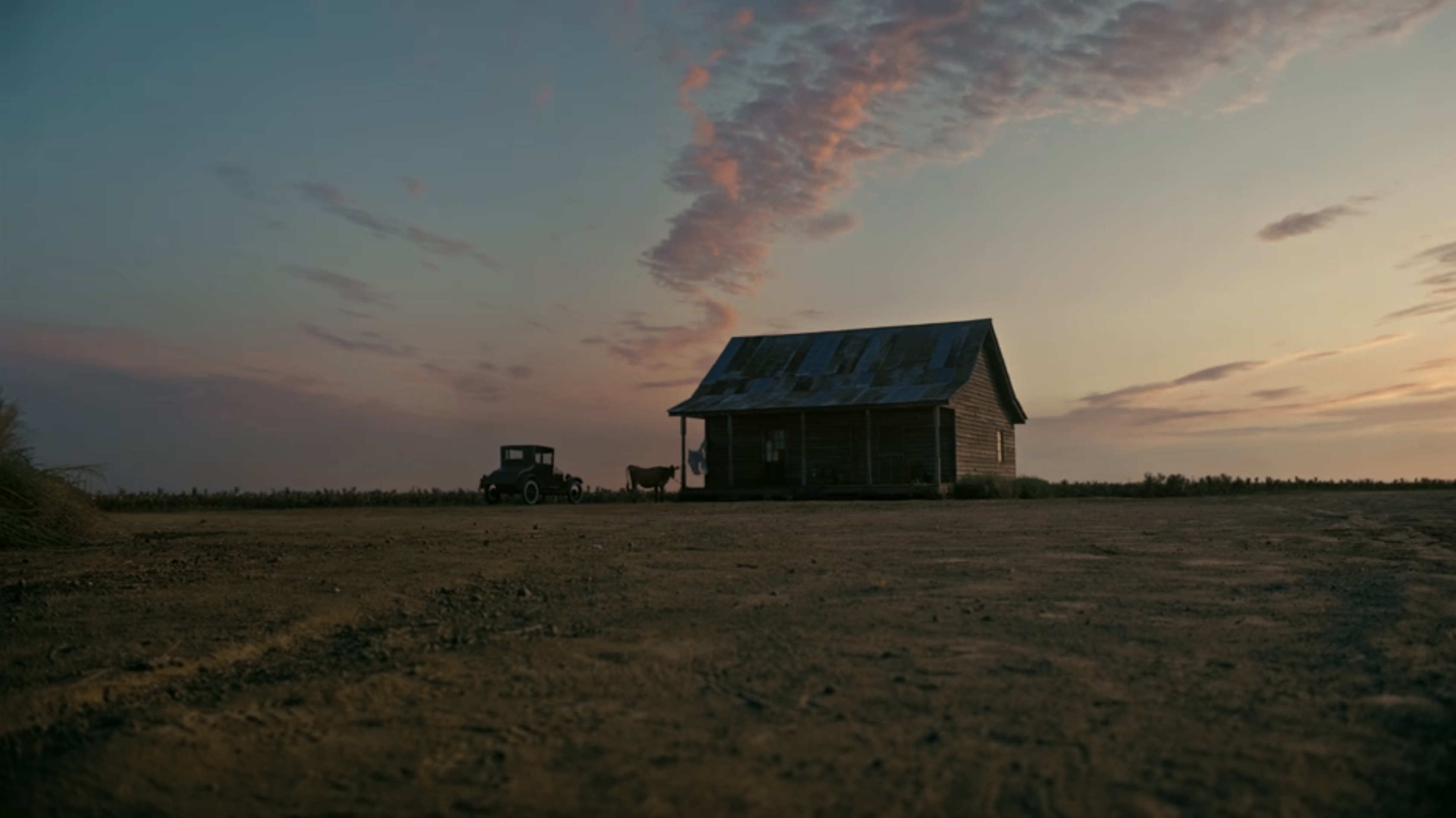 Opening scene in Sinners, Sammie Moore entering his father's church, in tatters and distraught, clutching the neck of his shattered guitar.